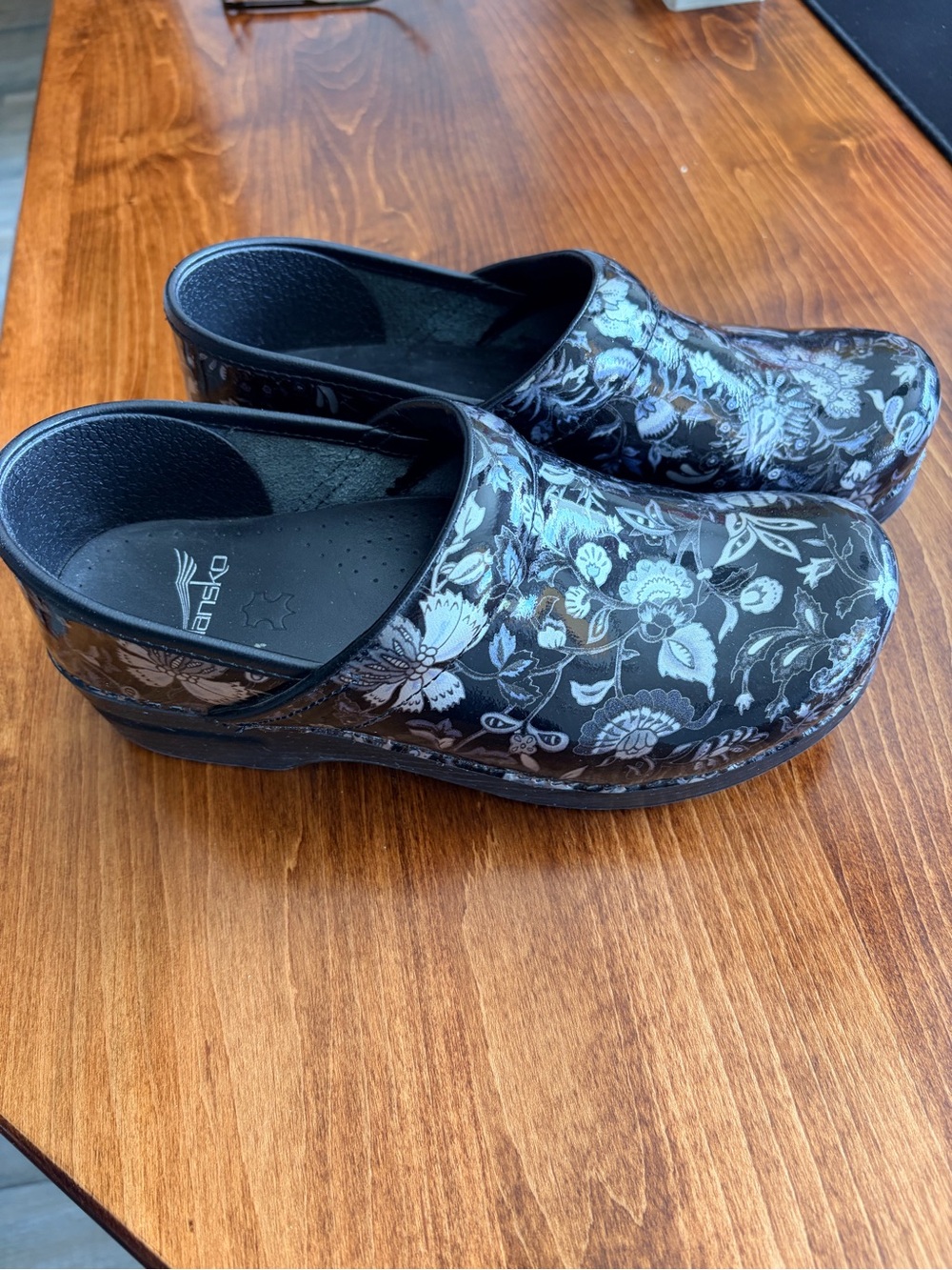 Dansko Black Floral Patent Leather Clogs